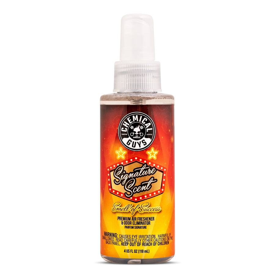Chemical Guys Signature Scent orange-yellow spray bottle on white background, front label visible