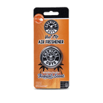 Chemical Guys branded orange blister pack showing a round black vent-clip air freshener with logo and 'Tropical Scent' text