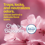 Close-up floral graphic with cherry blossom text and Febreze freshness logo describing odor-trapping floral scent.