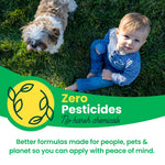 Overhead photo of a toddler seated on grass next to a small dog, with a green banner declaring 'Zero Pesticides' and supporting text below.