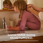Child sitting on a bathroom sink while an adult adjusts their hair; overlaid text reads ‘Leaves HANDS feeling MOISTURIZED.’