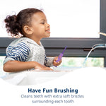Lifestyle image of a young child holding a purple patterned kids toothbrush at a sink with text overlay encouraging fun brushing.