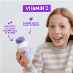 Smiling child holding a Jack N' Jill Tooth Sparkles bottle with purple vitamin D benefit graphics around them