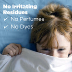Child peeking from under a blanket with text stating no irritating residues, no perfumes, no dyes