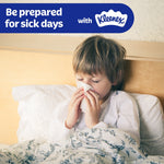 Child in bed using a tissue with a banner reading “Be prepared for sick days with Kleenex” across the top