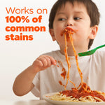 Lifestyle photo of a young child with spaghetti sauce on their face and shirt illustrating common food stains for laundry care