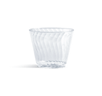 Clear Chinet Crystal disposable plastic cup with diagonal swirl pattern on white background, casting a soft shadow