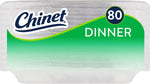 Close-up of Chinet packaging edge showing Chinet logo, green swirl design and "DINNER" label with 80 plates badge