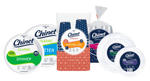Assortment of Chinet branded disposable tableware products including plates, cups and lids grouped together