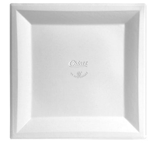 Close-up of a plain Chinet white square dinner plate showing embossed Chinet logo at the center