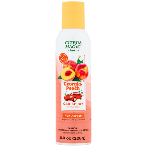 Tall Citrus Magic Georgia Peach car spray can with peach illustration and yellow cap on white background