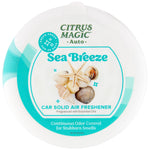 Top-down view of Citrus Magic Auto Sea Breeze solid air freshener lid showing seashell graphic and branding