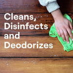 Hand wiping a wooden surface with a green cloth alongside large text that reads "Cleans, Disinfects and Deodorizes"