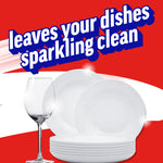 Stack of clean white plates and a wine glass with sparkles and headline 'leaves your dishes sparkling clean'