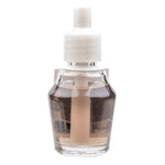 Clear refill bottle with white cap photographed upright on white background showing the bottle's dip tube and amber-tinted oil.