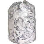 Clear trash bag filled with crumpled paper and labels, shown upright on a white background