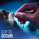 Close-up of hands clipping a ball-chain connector, demonstrating how to secure the hanging air freshener