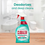 Cloralen disinfectant bathroom spray bottle on a wooden surface with blurred bathroom background and 'Deodorizes and deep cleans' text