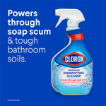 Clorox Bathroom Disinfecting Cleaner bottle on blue background with text "Powers through soap scum & tough bathroom soils."