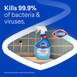 Clorox disinfecting bathroom cleaner bottle placed in a tiled bathroom scene with claim "Kills 99.9% of bacteria & viruses."