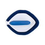 Top-down view of Clorox diamond-shaped scrubber with white plastic body and blue textured scouring pad