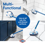 Four-panel collage showing the scrubber cleaning tile, tub and floor surfaces with central badge reading 'Use on all tub, tile, and shower surfaces'.