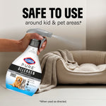 Hand spraying a Clorox PURE Allergen bottle toward a pet bed with headline stating 'Safe to use around kid & pet areas'