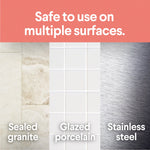 Graphic showing three surface types (sealed granite, glazed porcelain, stainless steel) with text "Safe to use on multiple surfaces."