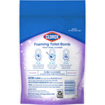 Back of a Clorox Foaming Toilet Bomb pouch showing usage icons and ingredient/precaution text on a purple gradient background.
