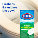 Lifestyle-style image of Clorox Bleach toilet tablets box over a flushing toilet bowl with text about freshening and sanitizing the bowl