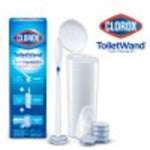 Clorox ToiletWand kit components arranged: wand, caddy and stacked refill pads on white
