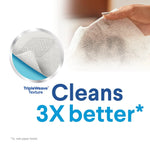 Close-up hand holding a textured Clorox TripleWeave wipe showing dirt removal with a circular inset of the fabric texture