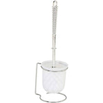 Close-up product photo of a chrome toilet brush inserted into a frosted cup-style holder on a chrome wire stand