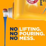 Close-up of a yellow Arm & Hammer detergent pour spout dispensing blue liquid with text No lifting. No pouring. No mess.