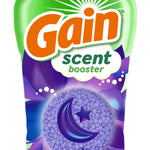 Close-up of the top half of a Gain scent booster bottle showing the logo, scent booster label and moon-themed bead graphic