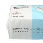 Close-up of white and blue soft face towel package showing cotton blossom icon and product name text