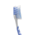 Close-up side profile of a toothbrush head showing layered blue and white bristles and part of a textured handle