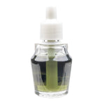 Close-up clear glass fragrance oil refill bottle showing inner wick and green-tinted oil under a white cap