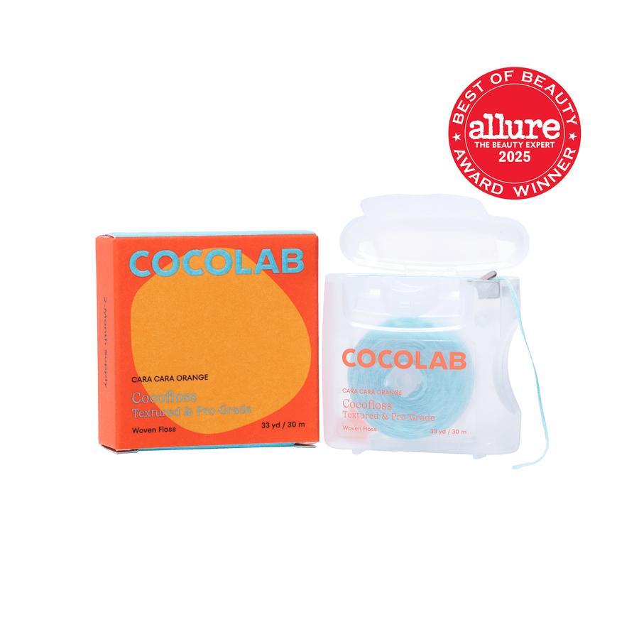Cocolab Cocofloss box and clear refill case with turquoise floss spool and Allure award badge on white background