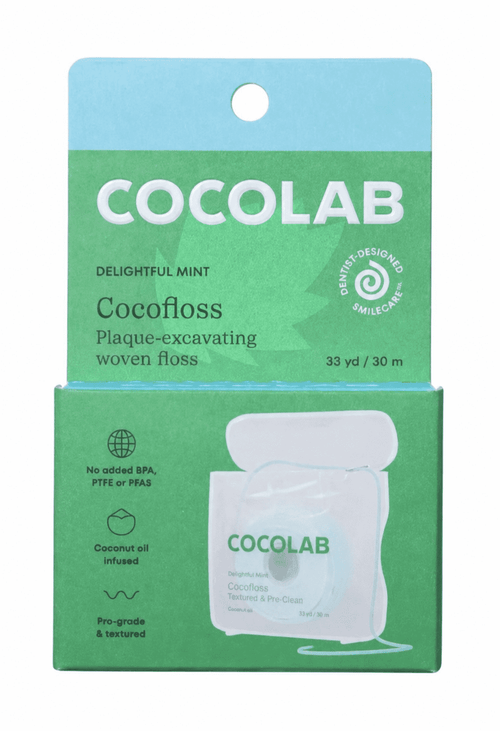 Studio product shot of COCOLAB Cocofloss retail hang-tab box showing branding, flavor and product illustration