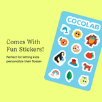 Sheet of colorful COCOLAB-themed stickers on a blue card with copy proclaiming 'Comes With Fun Stickers!' on a lime background