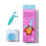Turquoise kid-sized reusable floss pick, translucent floss refill case and pink COCOLAB product box with bear illustration on white background