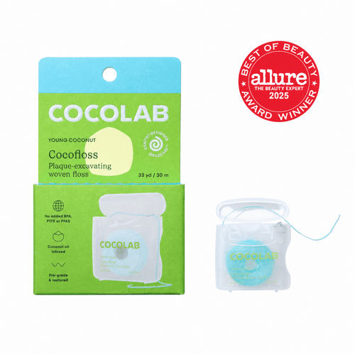 COCOLAB young coconut packaging: green product box displayed next to a translucent refillable floss dispenser, with an Allure award badge.