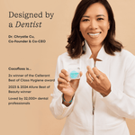 Dentist co-founder smiling and holding a Cocofloss refillable case with text calling the product designed by a dentist