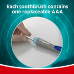 Colgate 360 toothbrush handle with a hand inserting a AAA battery, showing the removable battery compartment