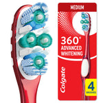 Close-up of a red Colgate 360 toothbrush head showing polishing cups and multi-directional bristles on red background.
