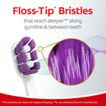 Graphic showing toothbrush head with purple 'floss-tip' bristles and a magnified inset highlighting thin tapered bristle tips.