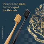 Gold and black Colgate Harry Potter soft toothbrushes displayed on a dark decorative background with text stating one black and one gold toothbrush