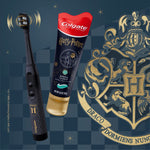 Promotional graphic featuring the black Colgate Harry Potter toothbrush and a themed Colgate toothpaste tube beside a gold crest.