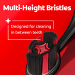 Close-up of toothbrush head showing multi-height bristles with overlay text explaining cleaning between teeth